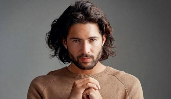 Slightly curled long hairstyles for men